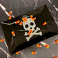 Halloween skull plate with chocolates